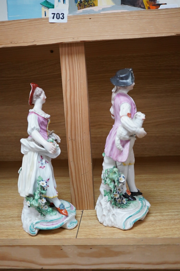 A pair of Derby figures of a lady and gentleman, c.1770-75, tallest 27cm high